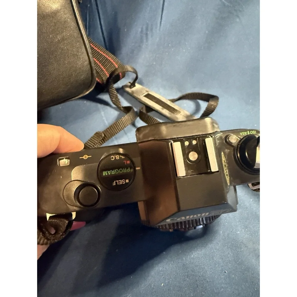 Canon T50 camera Vintage With Bag Will Power On Not Tested With Film